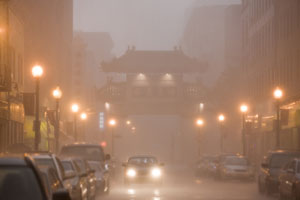 rain falls on an urban street